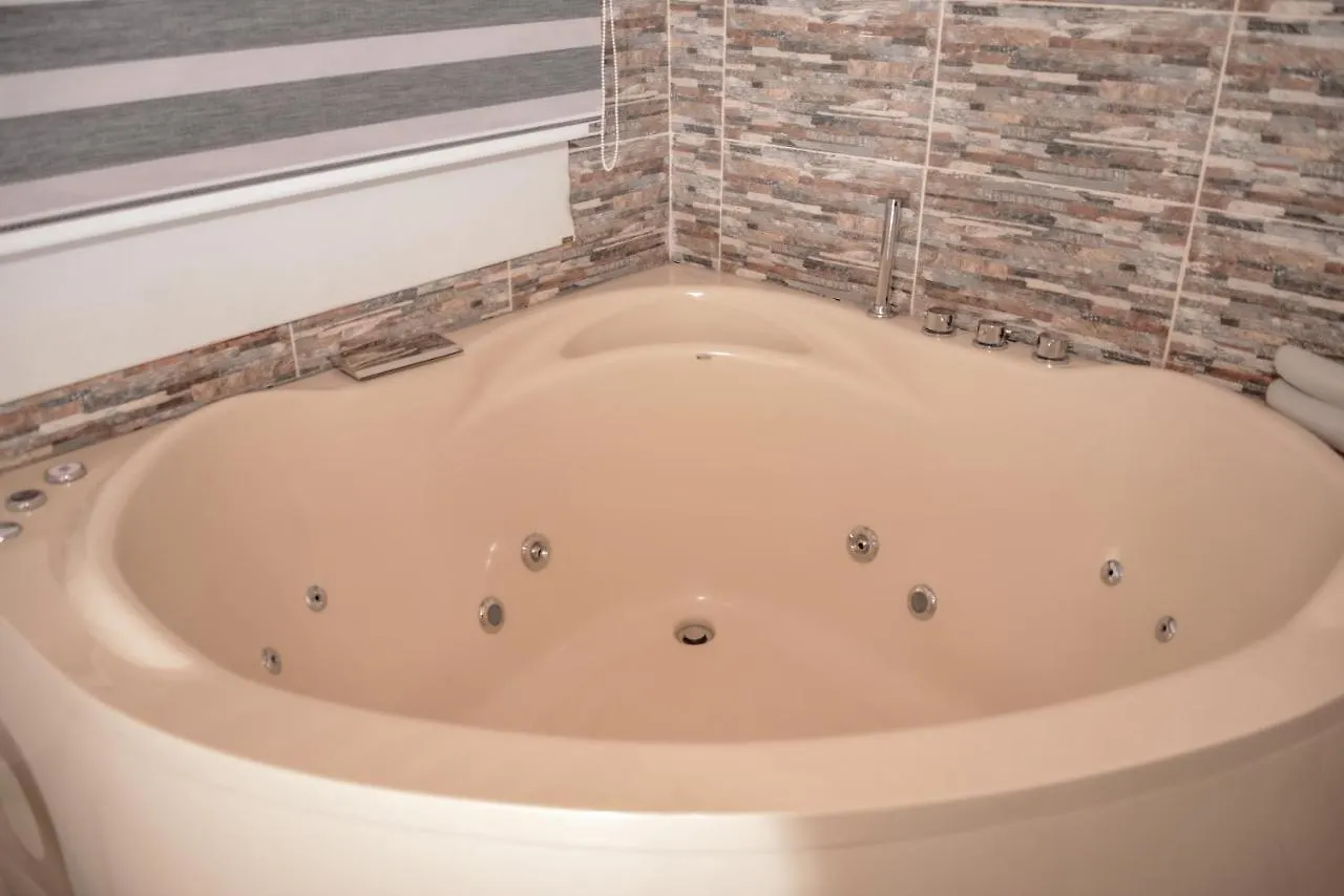 Апартаменты Poblado Brownstone Медельин