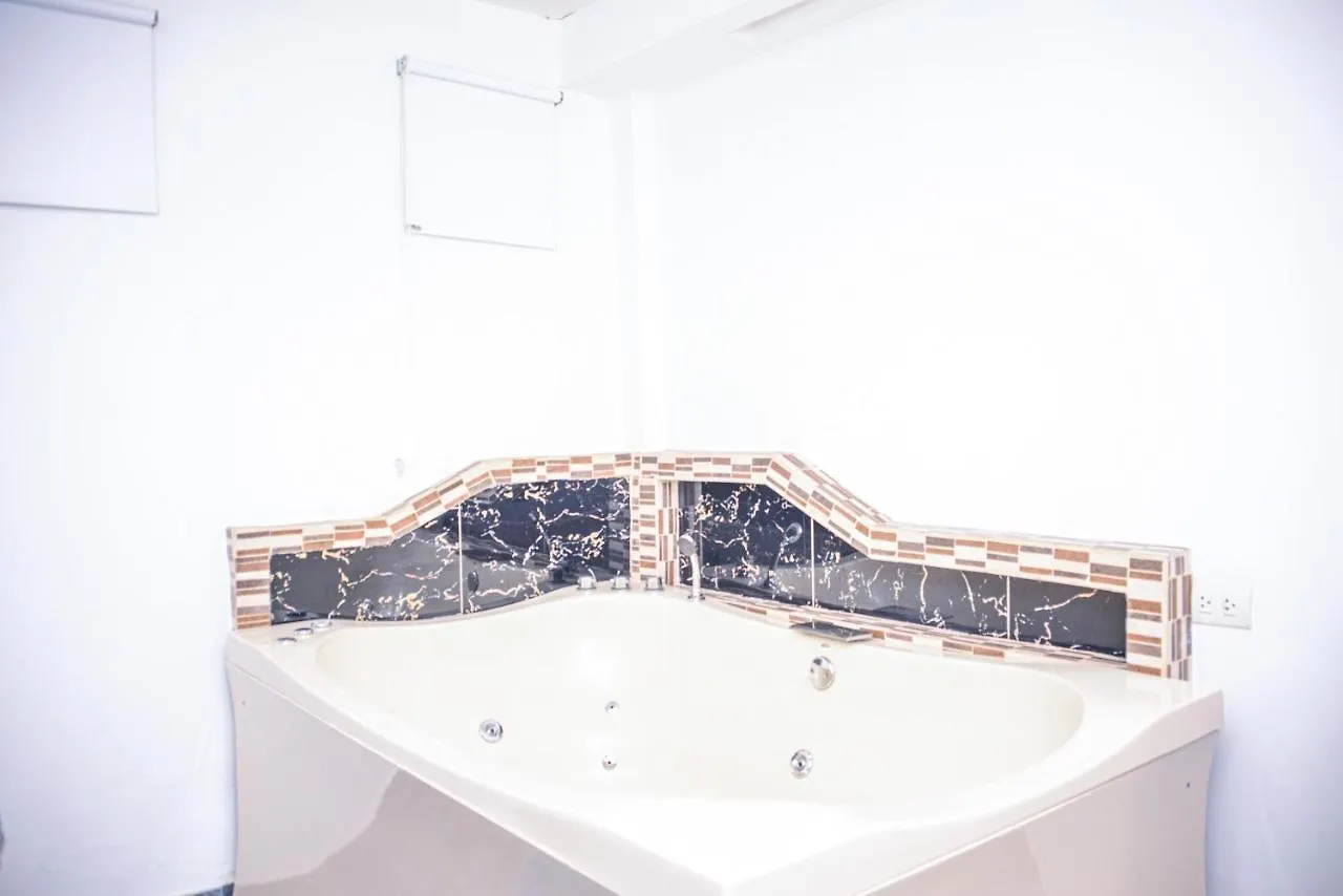 Апартаменты Poblado Brownstone Медельин